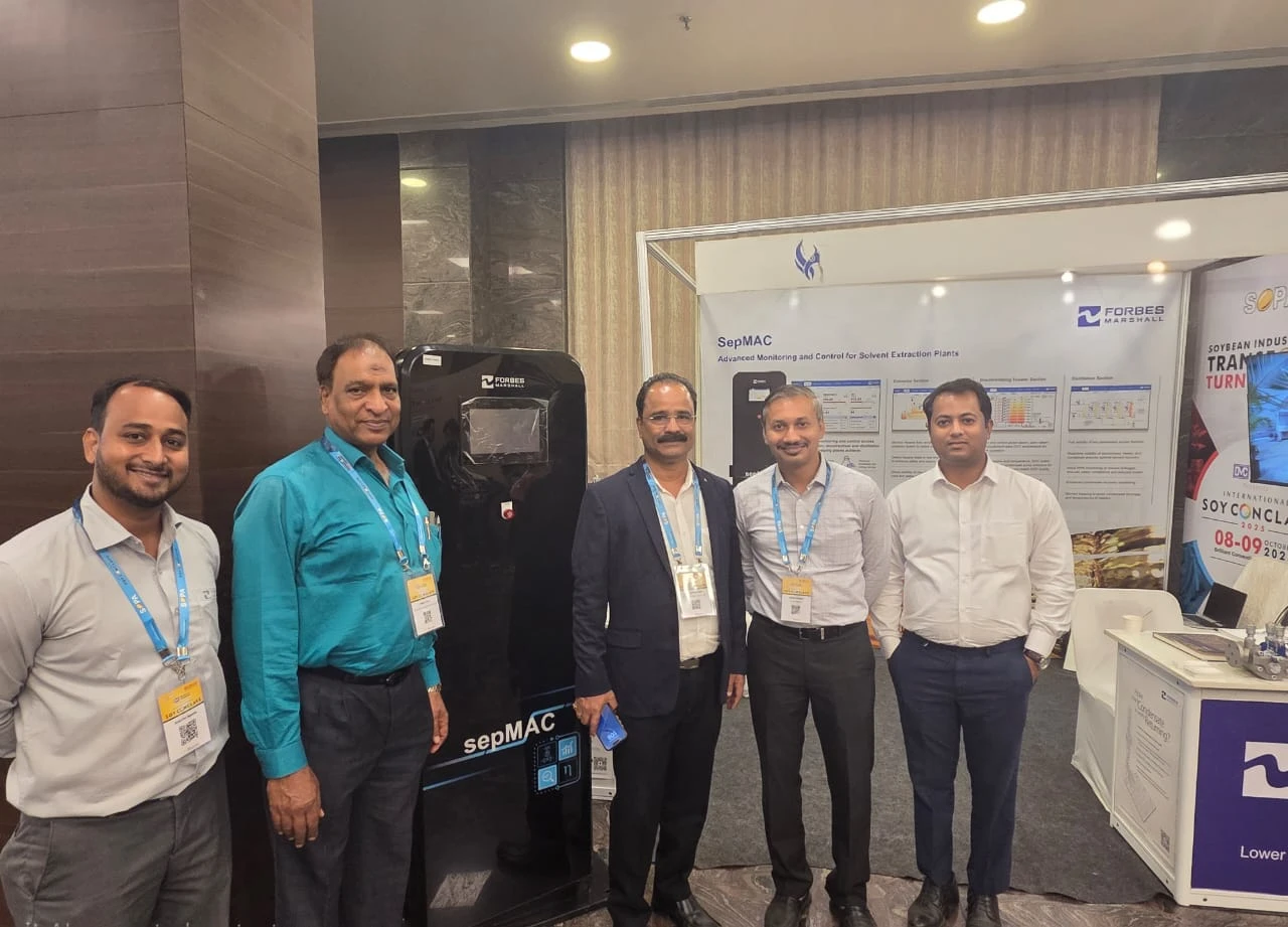 WhatsApp Image 2025-10-08 at 15.57.29_09f447b0 Picture of Forbes Marshall stall with customers at Soy conclave 2025.