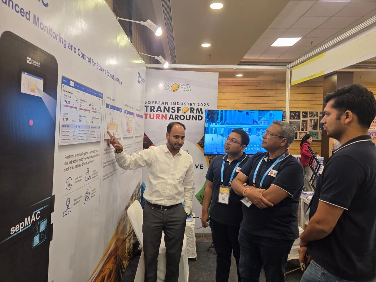 WhatsApp Image 2025-10-09 at 15.28.34_5780709c Picture from Forbes Marshall stall where members are seen interacting with the customers at Soy conclave 2025.